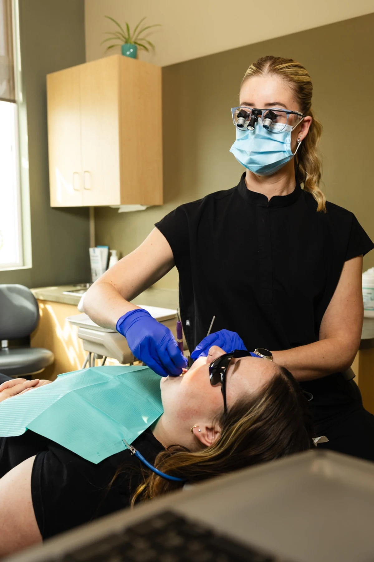 A member of our dental team caring for a patient